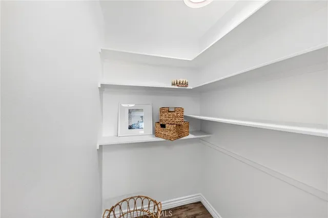 a view of a bathroom with sink and shower