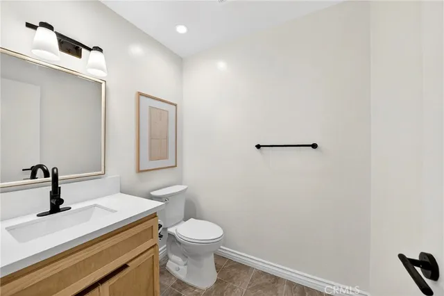 a backyard of a house with outdoor seating