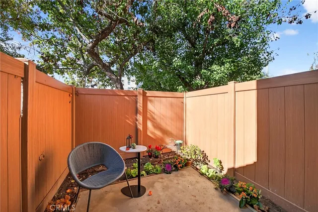 a front view of a house with yard and green space