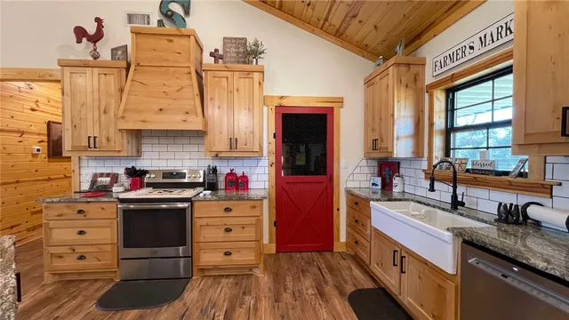 a living room with lots of wooden furniture