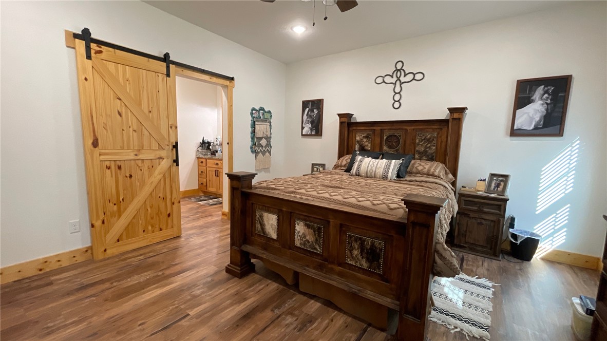 13541 East Us Highway Gause, TX 77857 - Photo 15 of 39 a living room with furniture and wooden floor