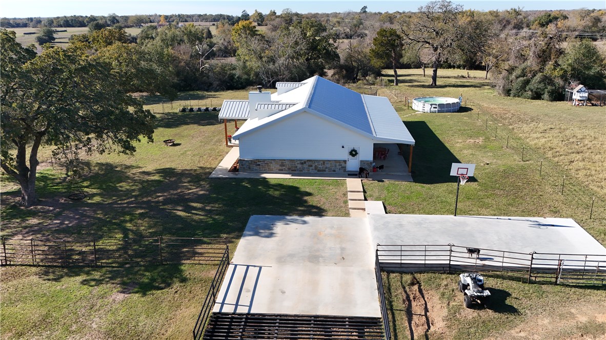 13541 East Us Highway Gause, TX 77857 - Photo 25 of 39 a view of a patio with table and chairs with wooden floor and fence