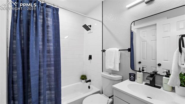 562 Blossom Field Road Fountain, CO 80817 - Photo 12 of 41 Brand new tile shower, bathtub, vanity, and fixtures