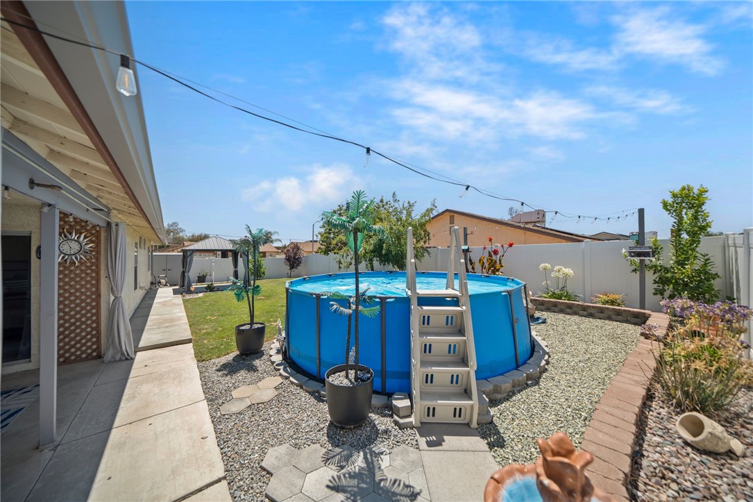 27879 Foxfire Street Menifee, CA 92586 - Photo 32 of 36 a view of a backyard with sitting area