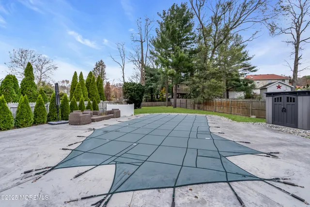 a view of a house with a yard porch and sitting area