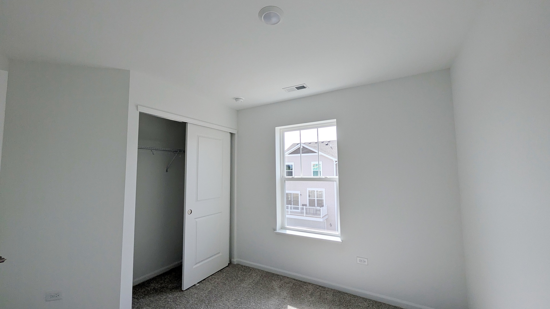 527 Red Oak Circle, Unit 2202 Volo, IL 60020 - Photo 12 of 17 a view of an empty room with a window