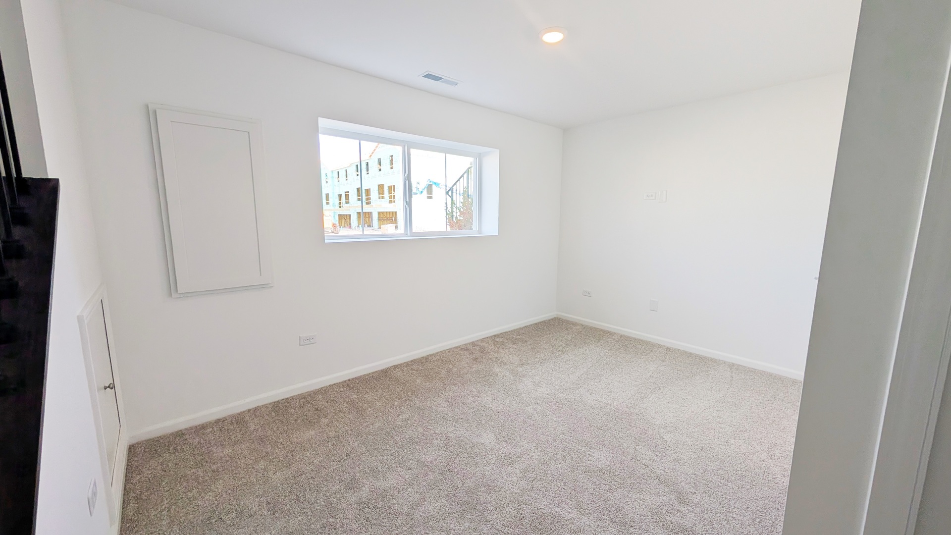 527 Red Oak Circle, Unit 2202 Volo, IL 60020 - Photo 15 of 17 an empty room with a window