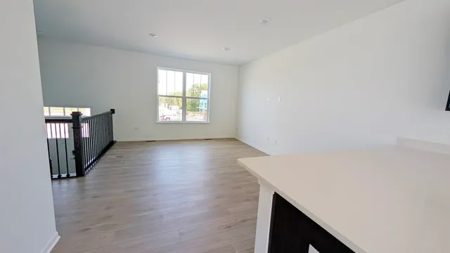 a view of livingroom with hardwood floor and window
