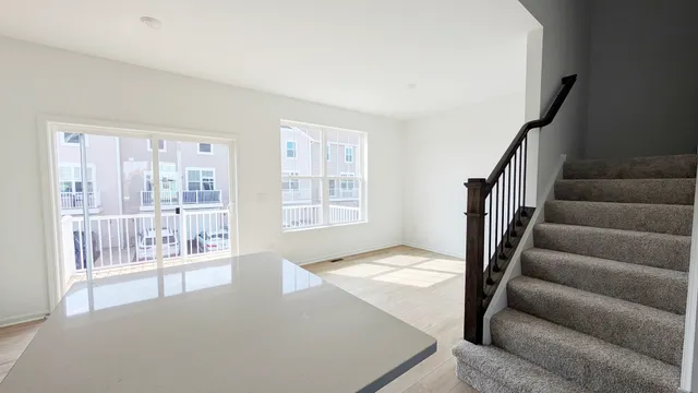 a view of livingroom with furniture and stairs
