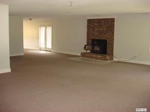104 Huffstetler Lake Road Dallas, NC 28034 - Photo 11 of 16 a view of empty room with fireplace