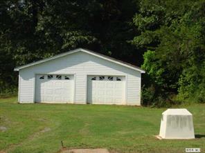 104 Huffstetler Lake Road Dallas, NC 28034 - Photo 12 of 16 a front view of house with yard and green space