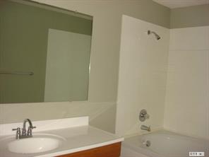 104 Huffstetler Lake Road Dallas, NC 28034 - Photo 16 of 16 a bathroom with a sink and a bathtub