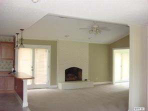 104 Huffstetler Lake Road Dallas, NC 28034 - Photo 3 of 16 a bedroom with a bed and a window