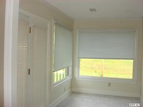 104 Huffstetler Lake Road Dallas, NC 28034 - Photo 5 of 16 a view of an empty room and window