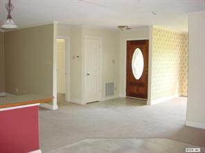 104 Huffstetler Lake Road Dallas, NC 28034 - Photo 7 of 16 a view of a livingroom with wooden floor and a sink