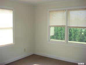 104 Huffstetler Lake Road Dallas, NC 28034 - Photo 9 of 16 an empty room with a window
