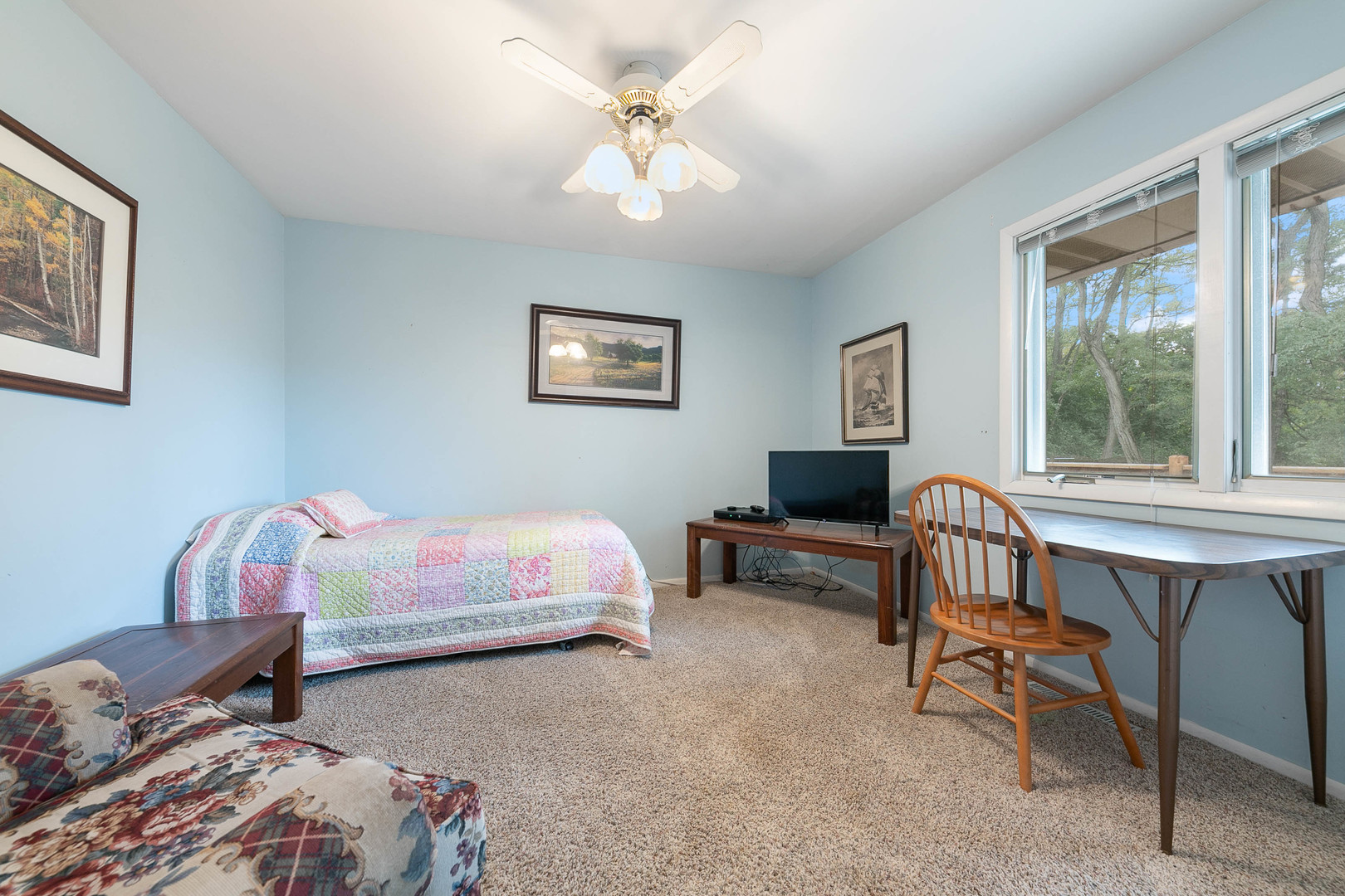 28W151 Garys Mill Road Winfield, IL 60190 - Photo 14 of 37 a bedroom with a bed and a chandelier