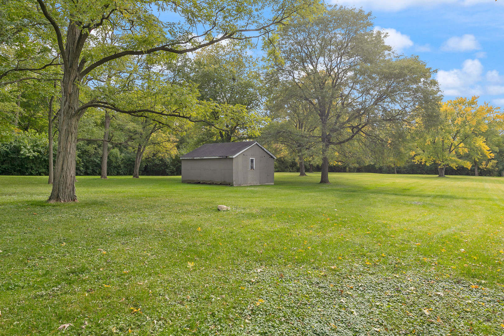 28W151 Garys Mill Road Winfield, IL 60190 - Photo 23 of 37 a view of outdoor space with deck and yard