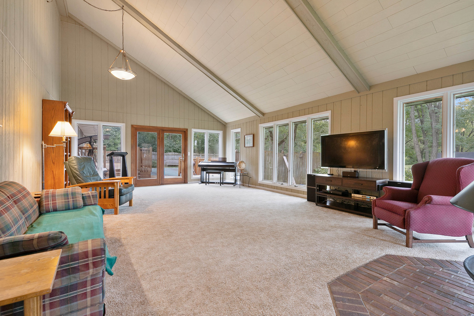 28W151 Garys Mill Road Winfield, IL 60190 - Photo 8 of 37 a living room with furniture and a flat screen tv