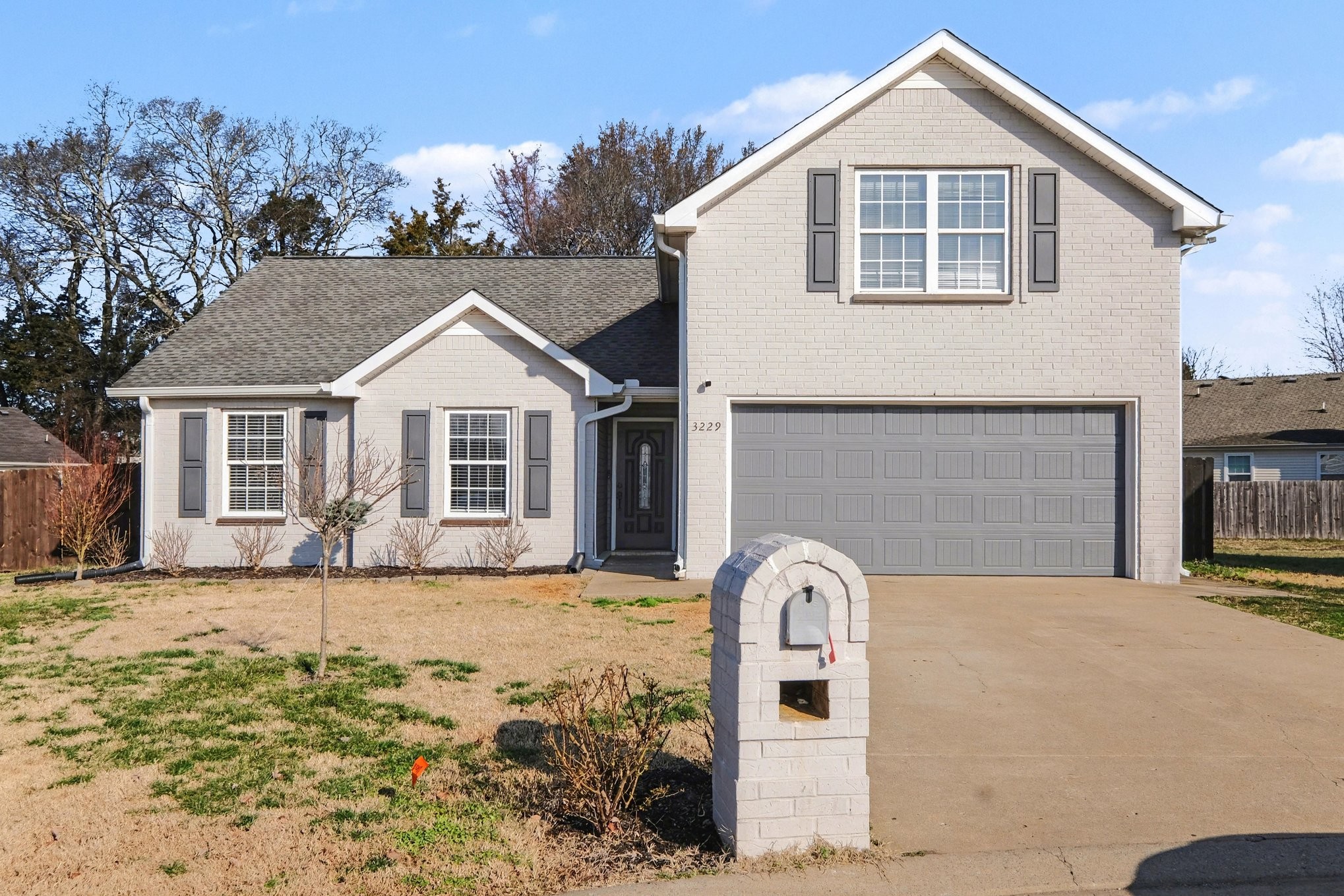 3229 Lexmark Circle Murfreesboro, TN 37128 - Photo 1 of 31 a front view of a house with a yard