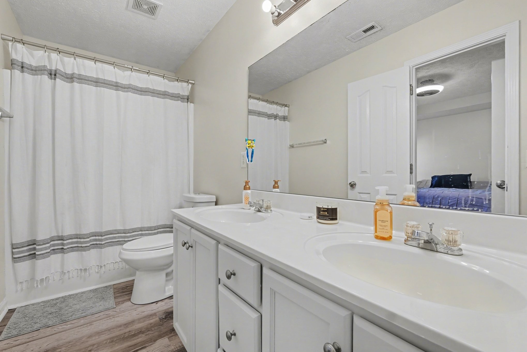 3229 Lexmark Circle Murfreesboro, TN 37128 - Photo 15 of 31 a bathroom with a sink and a mirror