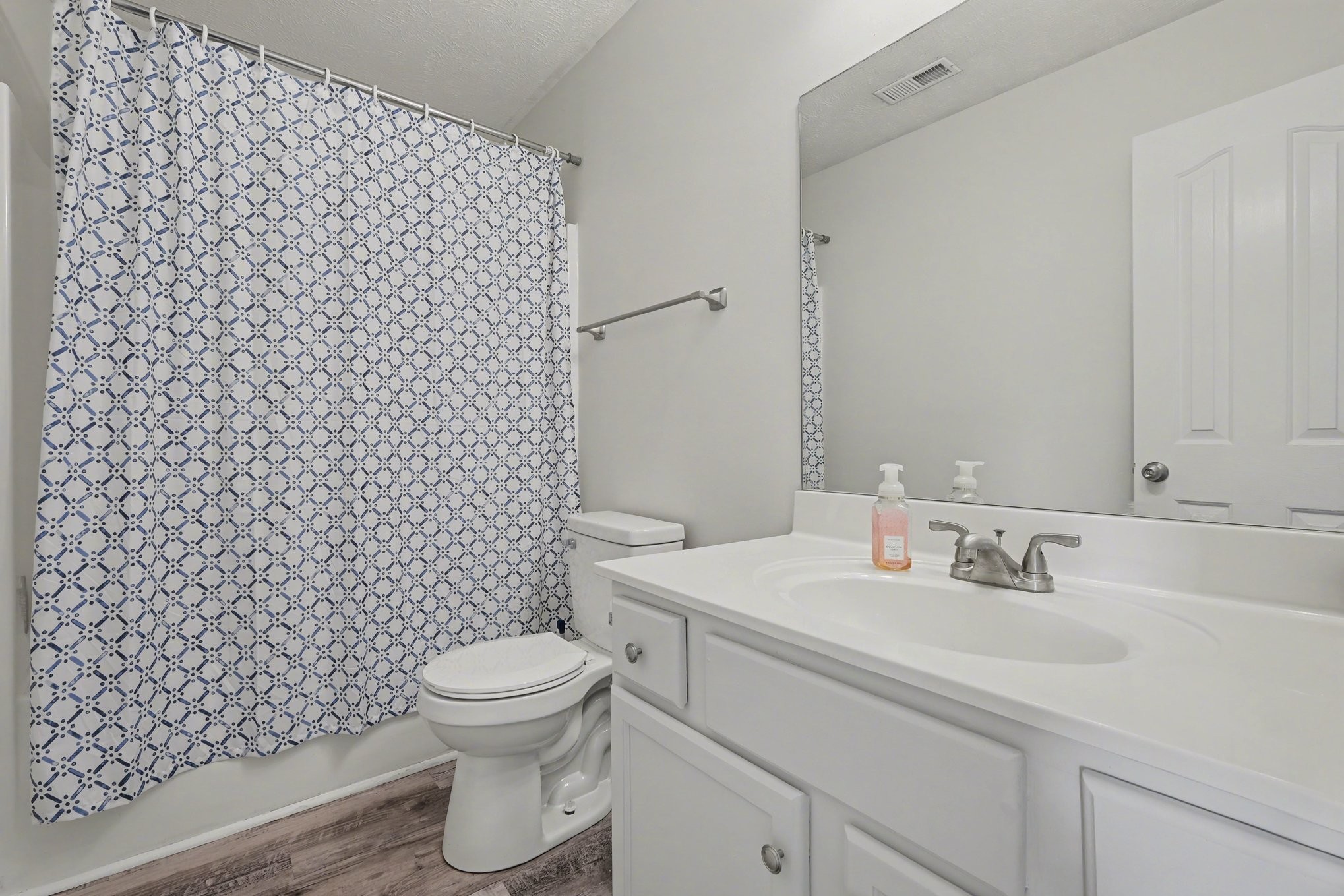 3229 Lexmark Circle Murfreesboro, TN 37128 - Photo 16 of 31 a bathroom with a sink toilet and a mirror