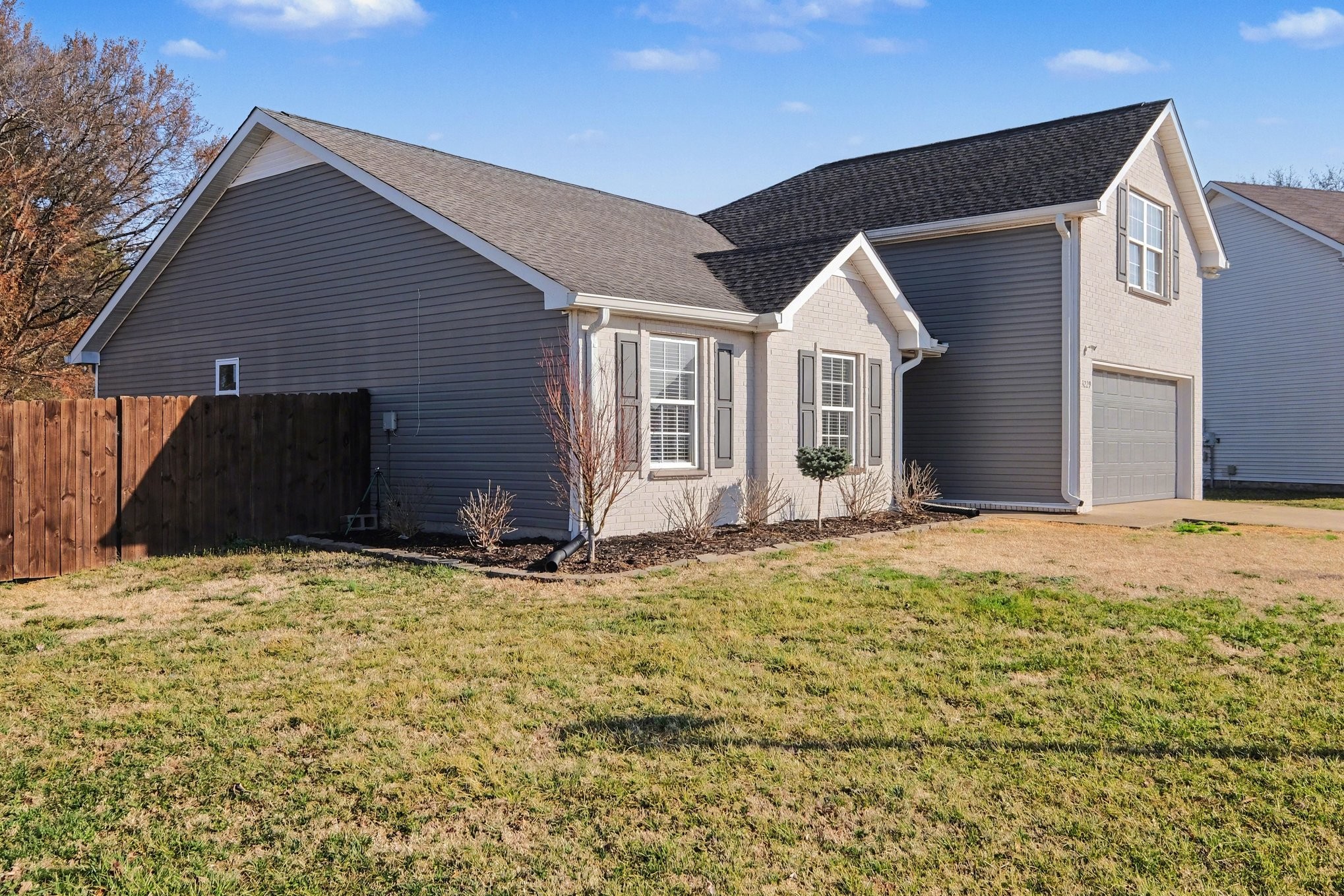 3229 Lexmark Circle Murfreesboro, TN 37128 - Photo 2 of 31 a house with yard in front of it