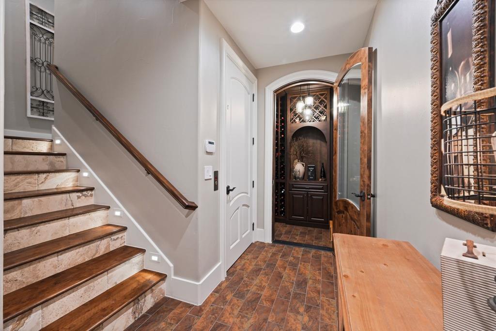 325 River Ridge Spring Branch, TX 78070 - Photo 26 of 40 a view of a hallway with wooden floor and staircase
