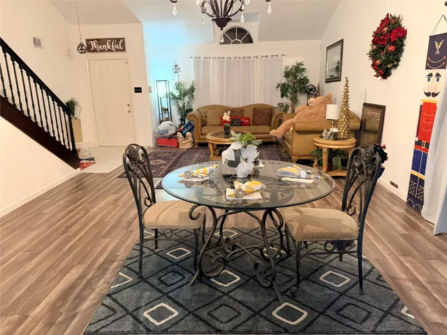 a view of a dining room with furniture