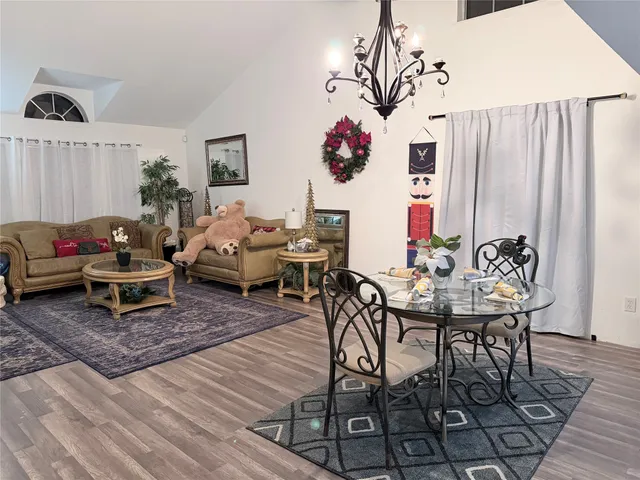 a view of a livingroom with furniture and rug