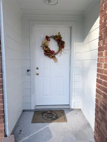 a view of a utility room with a sink