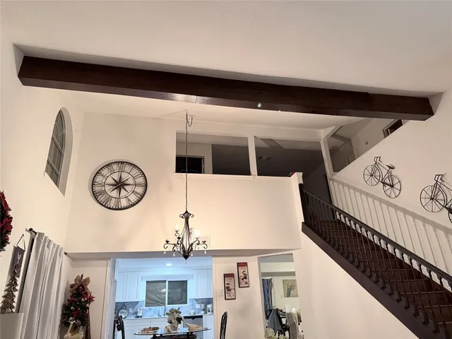 a view of a hallway with entryway