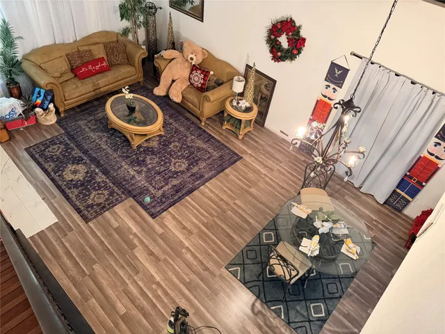 a living room with furniture and a rug