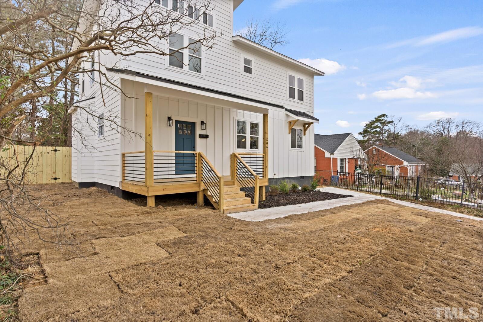 1808 Poole Road Raleigh, NC 27610 - Photo 3 of 35 a view of a house with a yard