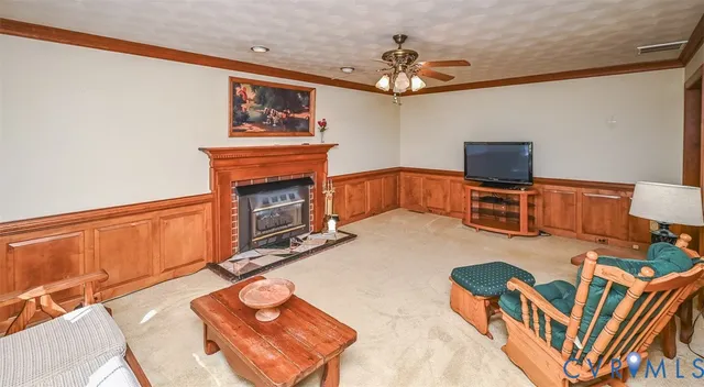 a bedroom with furniture and a fireplace