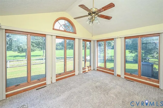 a view of an empty room and window