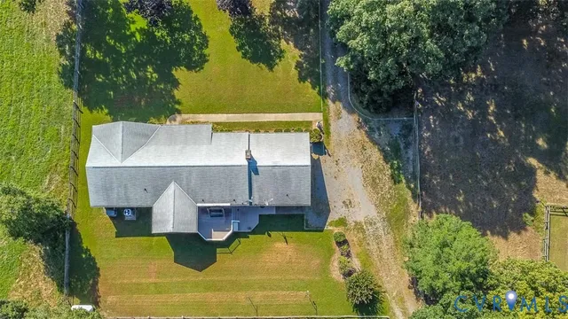 a view of a park with plants and trees