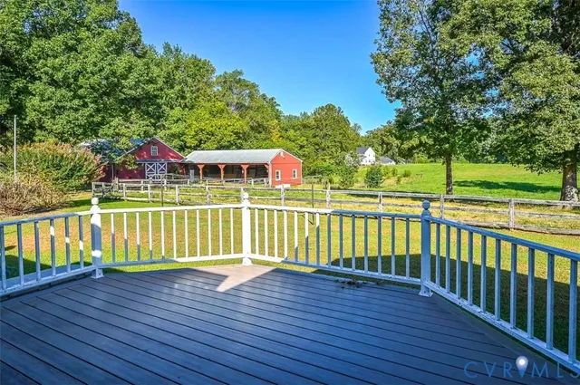 a view of a tables and chairs in patio