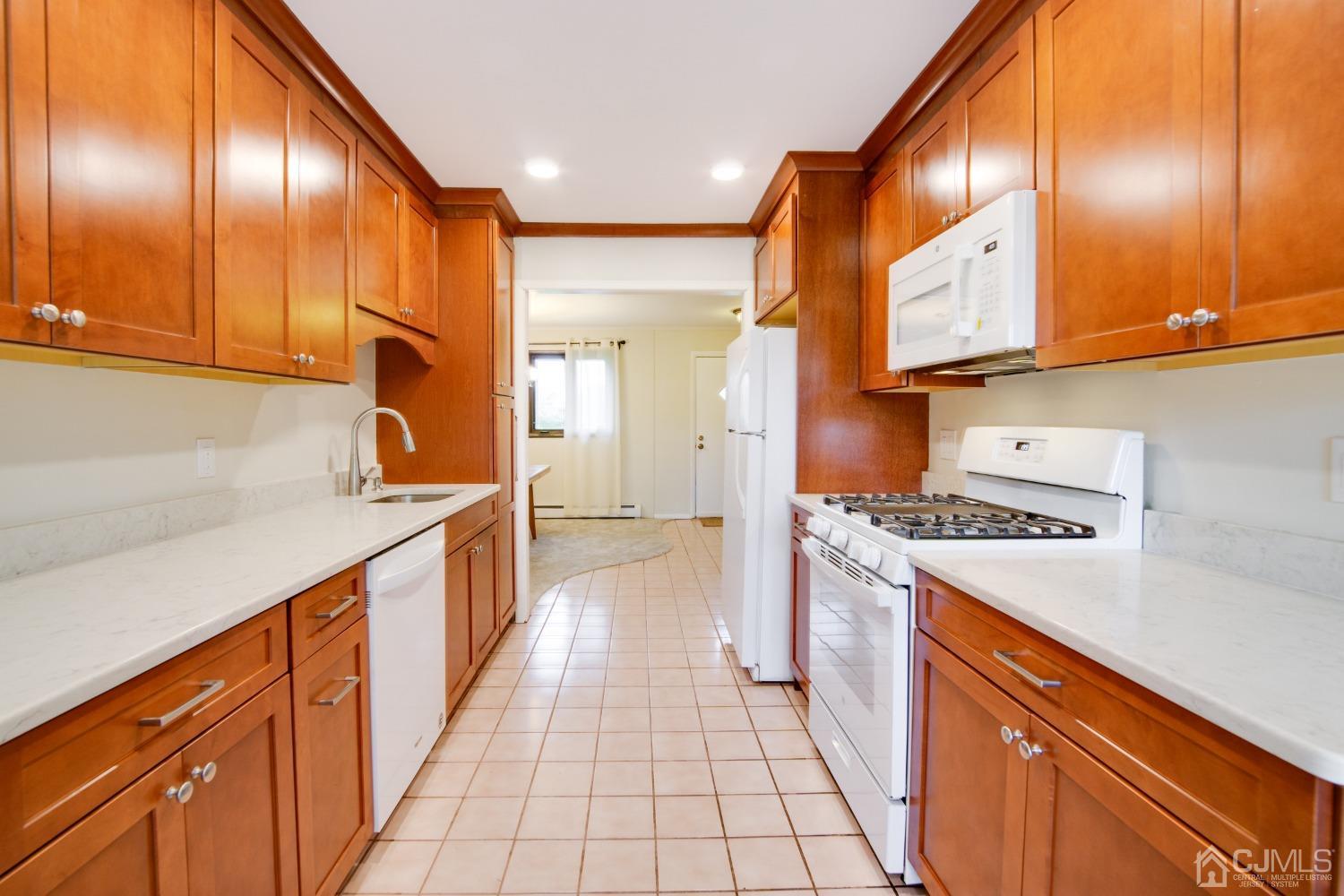 4 Stanworth Road Kendall Park, NJ 08824 - Photo 6 of 19 Kitchen and Foyer