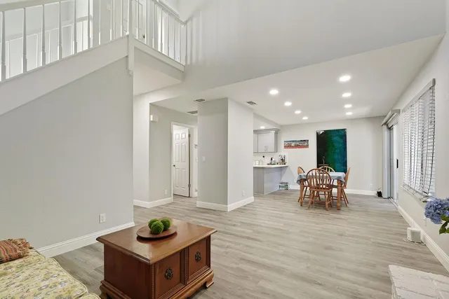 a living room with furniture and a table