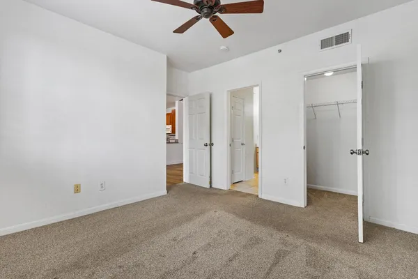 a view of a bathroom with a glass shower door
