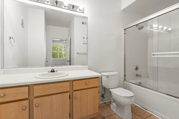 a front view of a house with yard