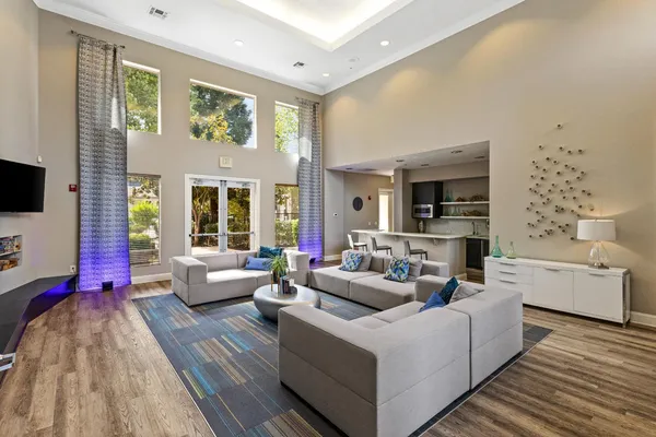 a room with a wooden floor and a fireplace