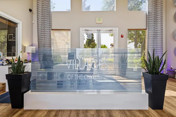 a bathroom with a sink a vanity and a mirror