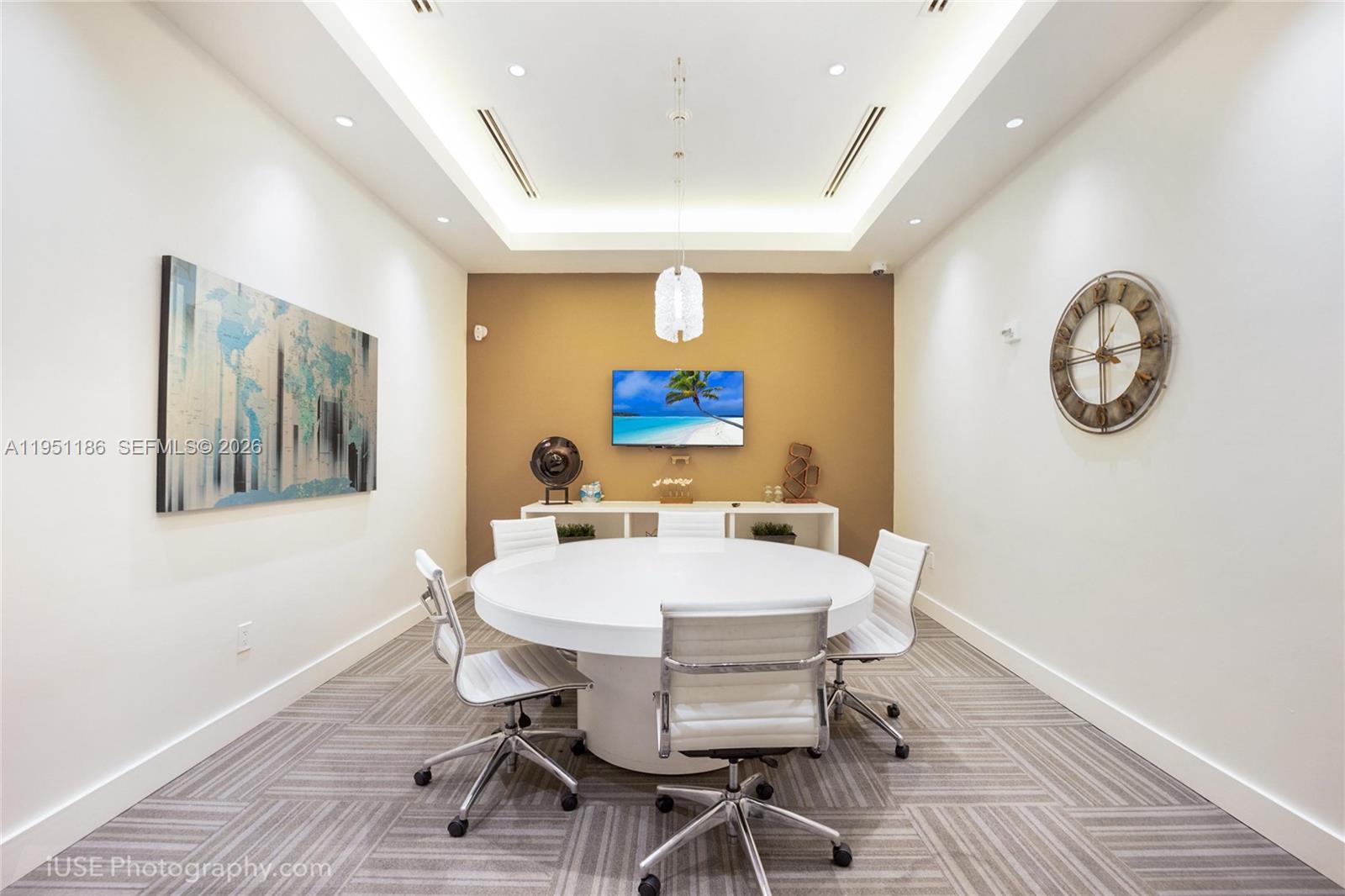 999 Southwest 1st Avenue, Unit 1208 Miami, FL 33130 - Photo 13 of 17 a view of a dining room with furniture window and wooden floor