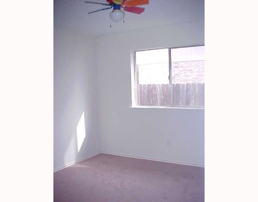 7925 Elk Drive, Unit 1 Corpus Christi, TX 78414 - Photo 6 of 8 a view of an empty room with a window