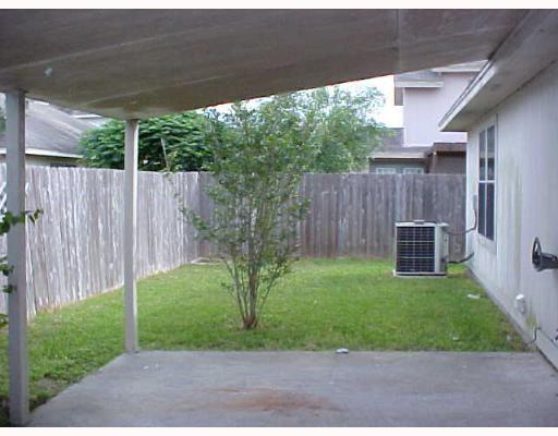 7925 Elk Drive, Unit 1 Corpus Christi, TX 78414 - Photo 8 of 8 a view of a backyard