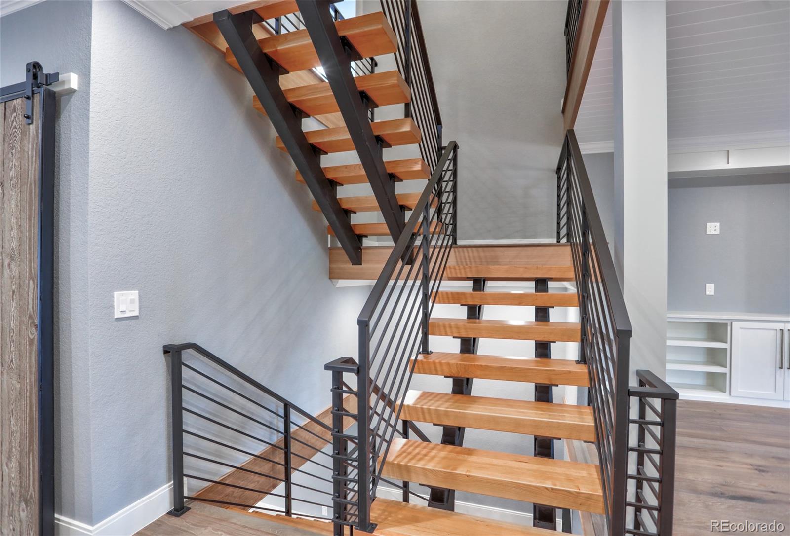 2732 South Jackson Street Denver, CO 80210 - Photo 14 of 40 a view of entryway with wooden floor