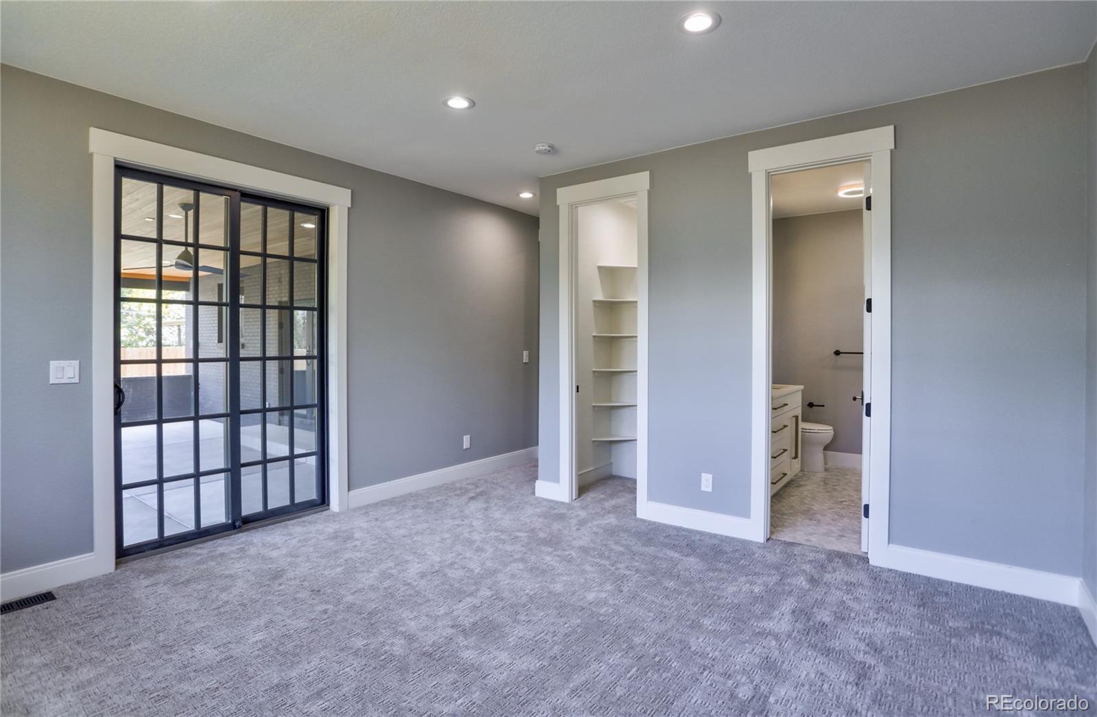 2732 South Jackson Street Denver, CO 80210 - Photo 18 of 40 wooden floor and closet in a room