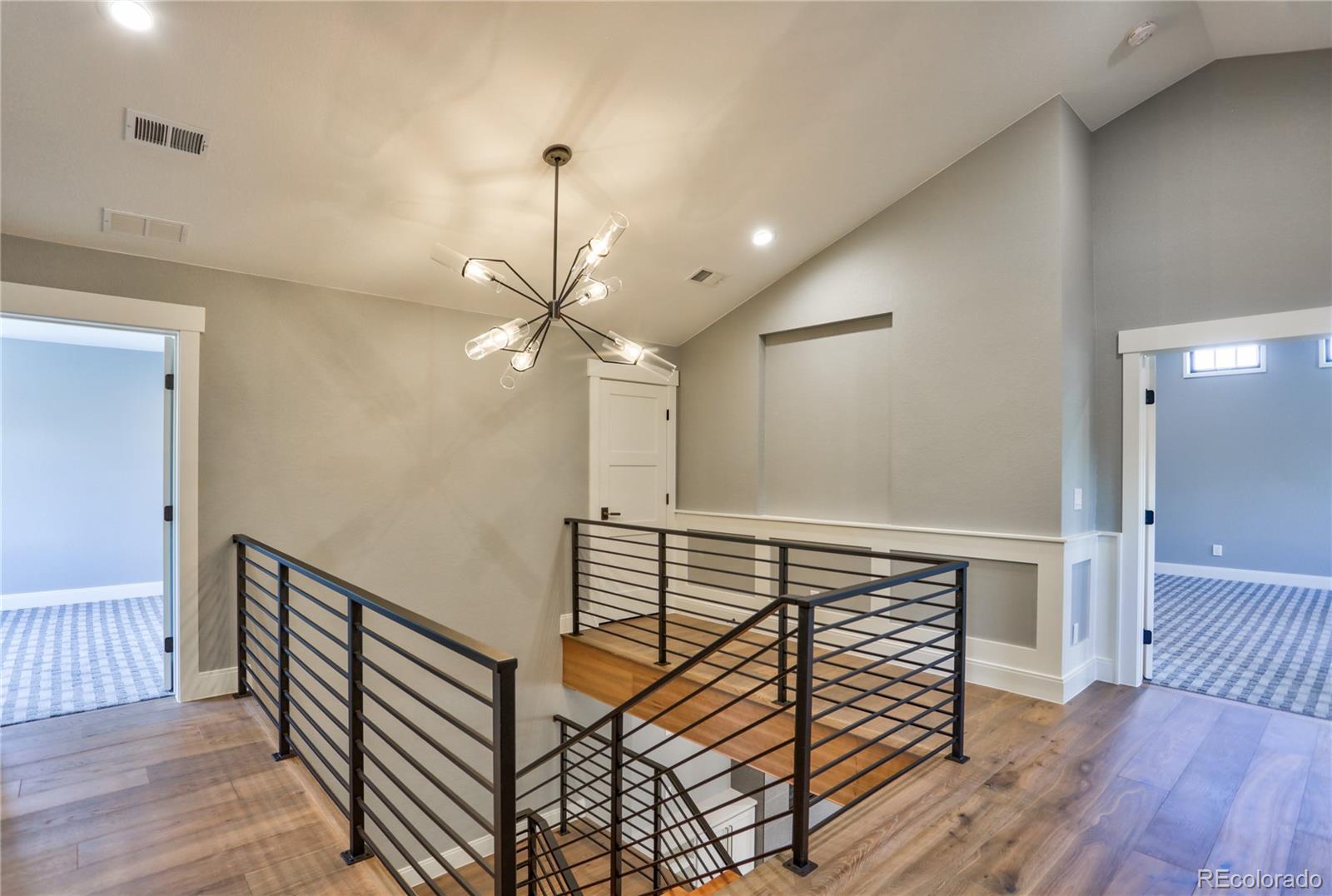 2732 South Jackson Street Denver, CO 80210 - Photo 23 of 40 a view of entryway with wooden floor